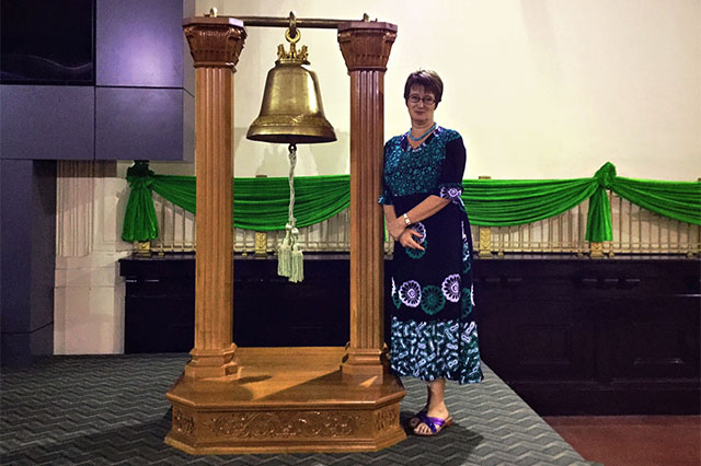 Vicky Bowman, Director of the Myanmar Centre for Responsible Business, pictured beside the bell of the Securities and Exchange Commission.