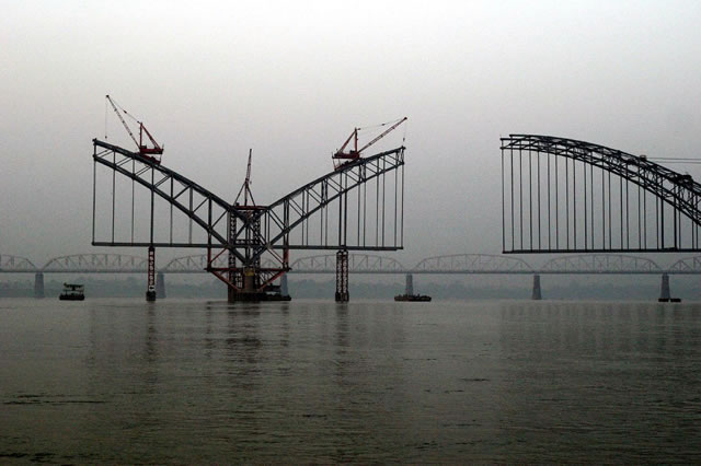 Bridge over the Irrawaddy. Hanging over the China-Myanmar relationship, and dominating every press conference, is the question of the Myitsone dam. Photo: Sean Ryan (flickr.com/aphid)